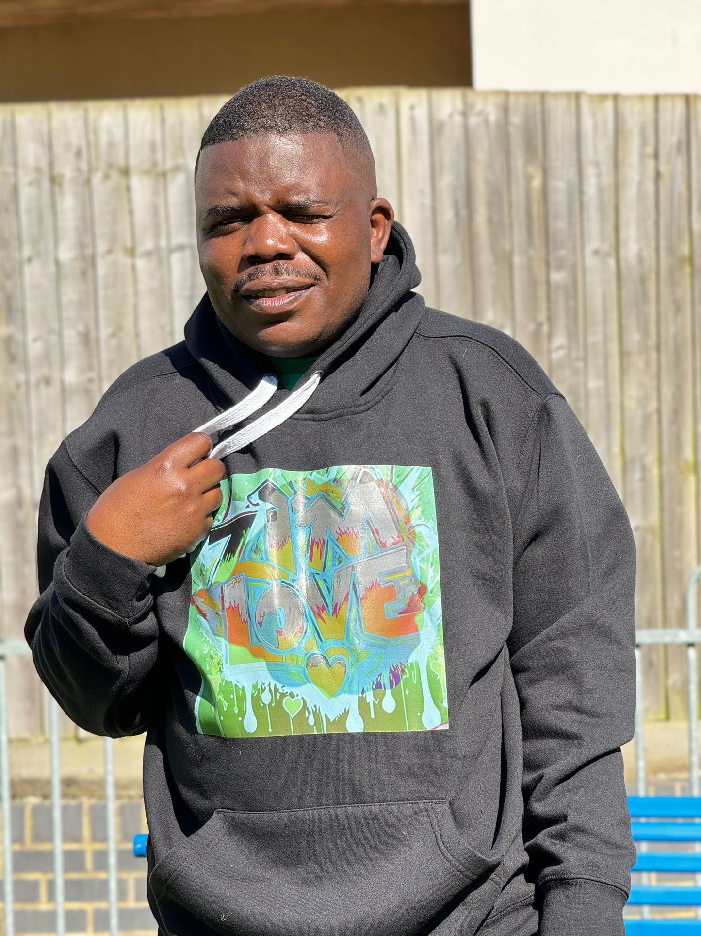 Black hoodie with green print